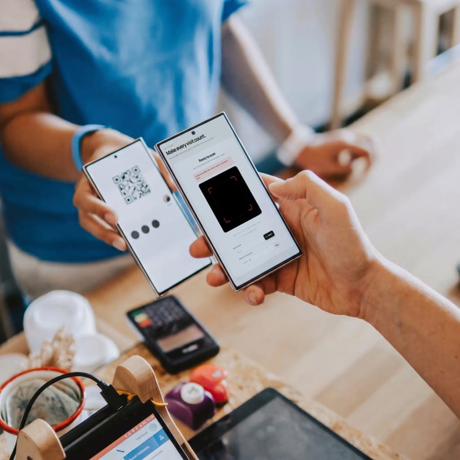 Customer scanning a shop QR code with their phone